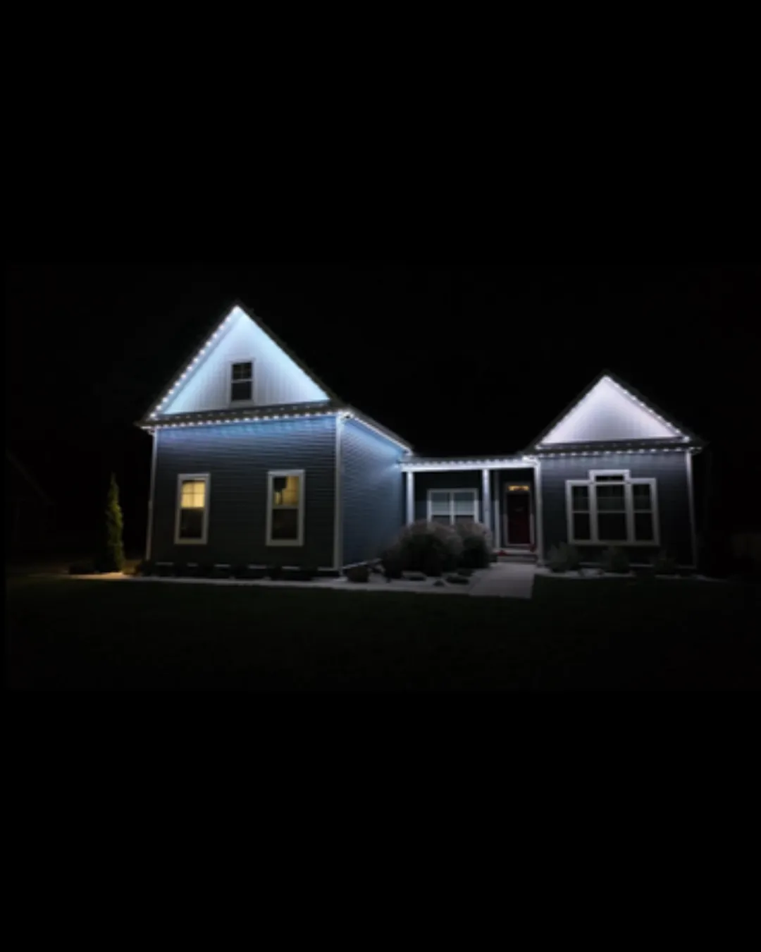 Permanent holiday LED lights installed on home eaves in Macomb County, MI