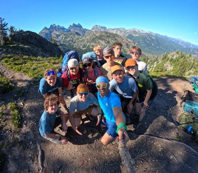 Kelly Ditto coaching a client on public speaking in a modern office