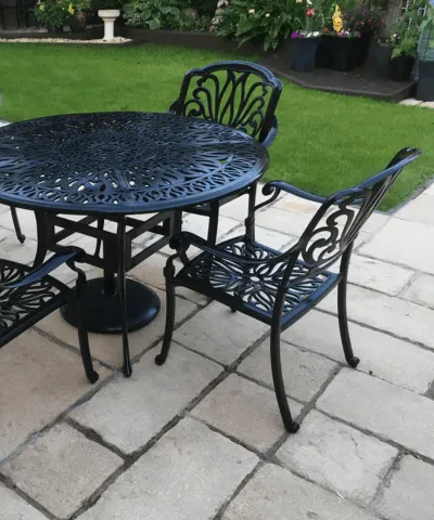 A photo of garden furniture that our Swansea sprayers sprayed black