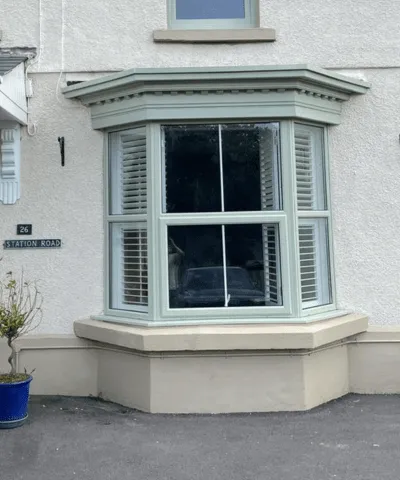 A finished bay window in Swansea that we sprayed chartwell green