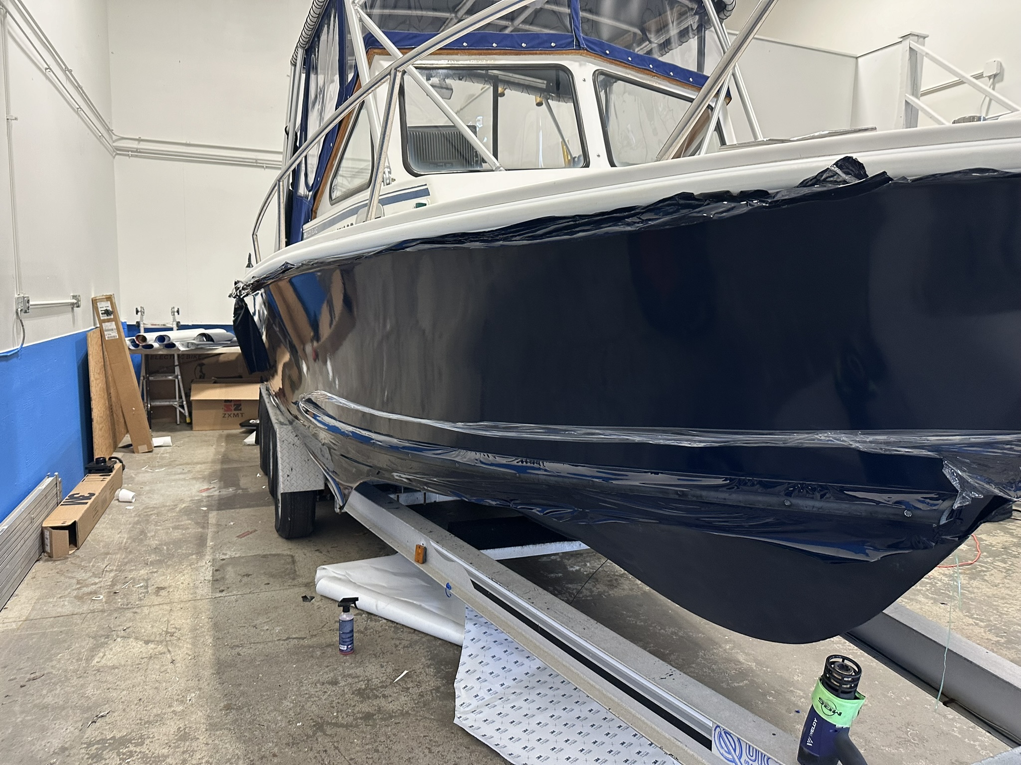 Luxury yacht with customized exterior and interior wraps by WeWrap, providing high-quality finishes and protection. Find expert yacht wrapping services near me.