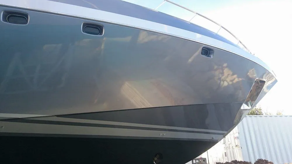 Luxury yacht with customized exterior and interior wraps by WeWrap, providing high-quality finishes and protection. Find expert yacht wrapping services near me.