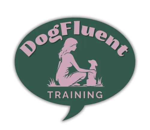 A speech bubble with DogFluent written across the top in an arc with a silhouette of a lady and a dog below in the center, and the word TRAINING written below them