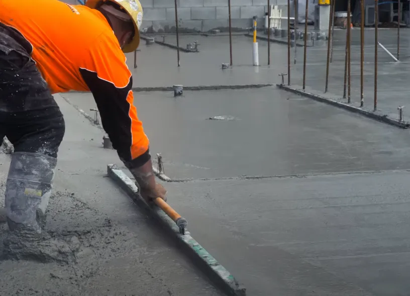 Concrete contractor leveling the floor