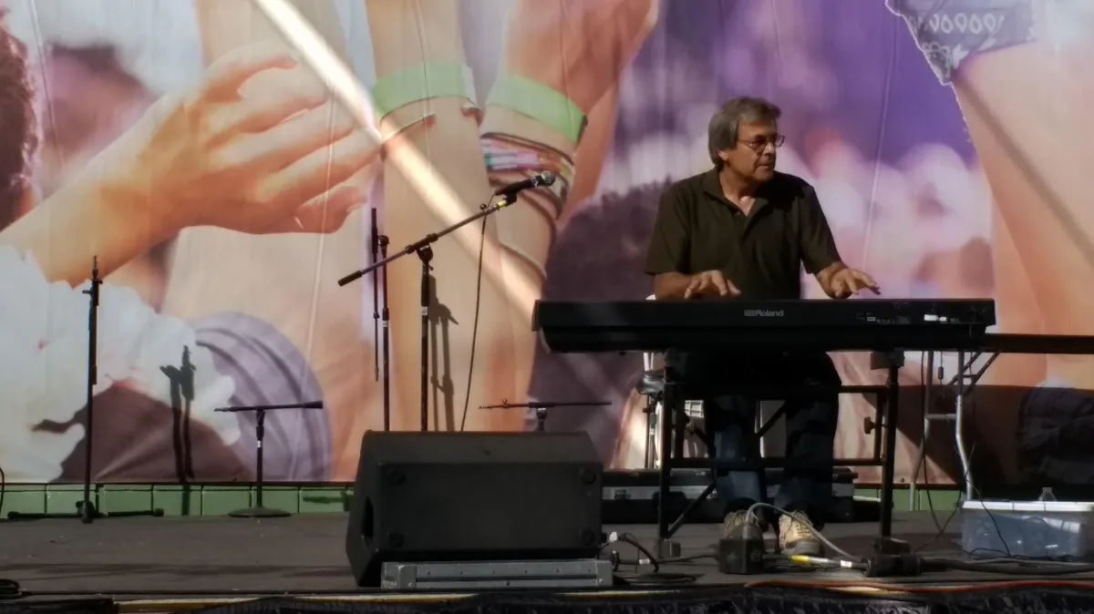 Greg Pane performing live at a festival