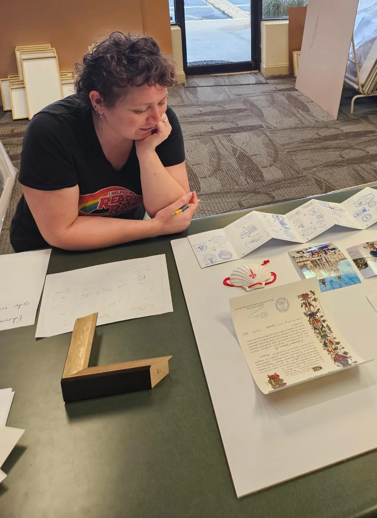 Custom picture framing consultation at Friedman’s Framing in Savannah, GA, featuring collaborative frame design planning, matting samples, and museum-quality custom framing guidance.