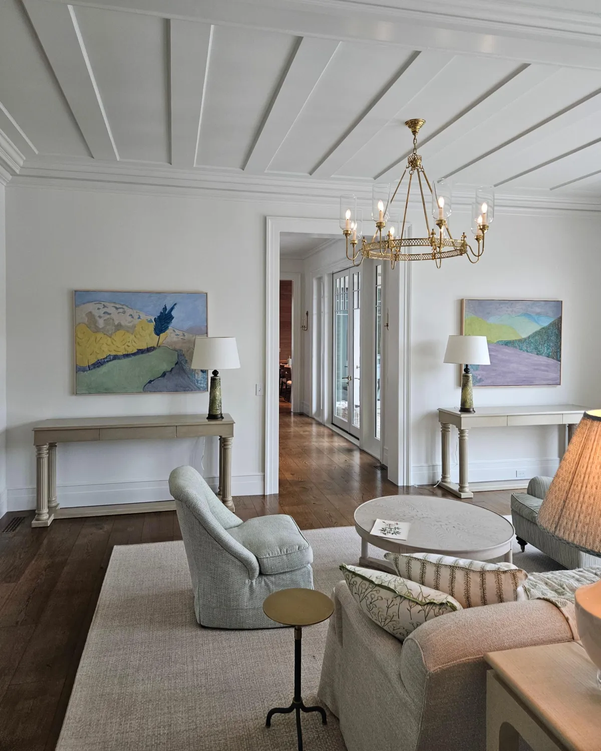 Residential art installation and gallery wall hanging service in Savannah, GA featuring professionally installed framed artwork in a modern home interior.