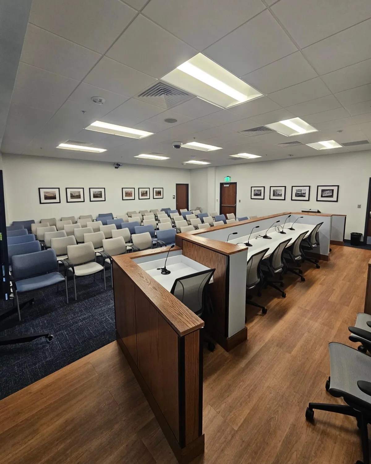 Commercial office and conference room featuring professionally installed framed artwork as part of a large-scale commercial framing project in Savannah, GA.