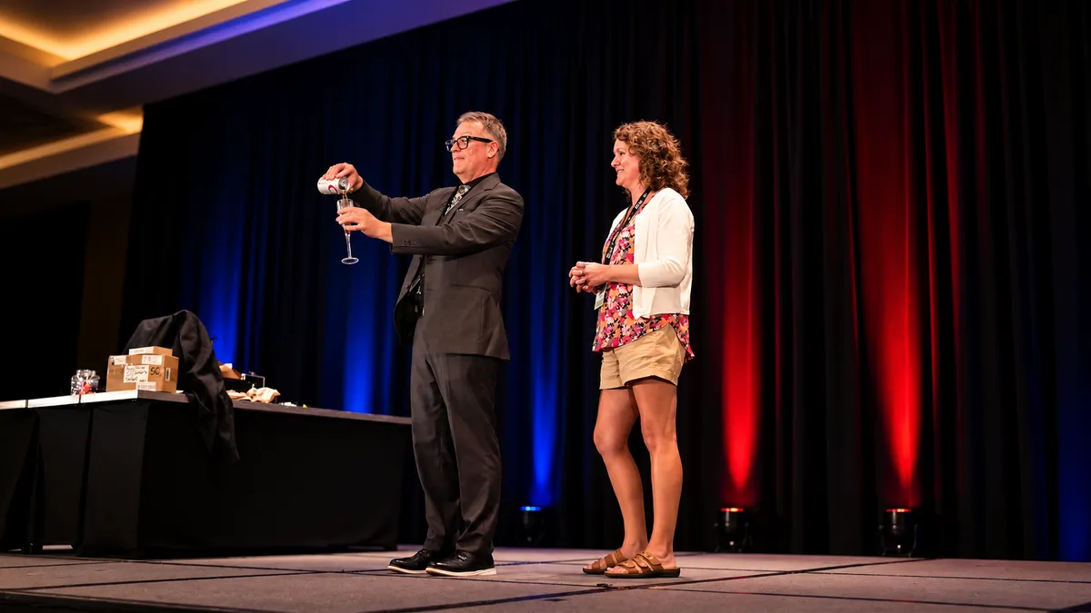 Arthur performing sophisticated mentalism mind-reading demonstration with an executive audience member