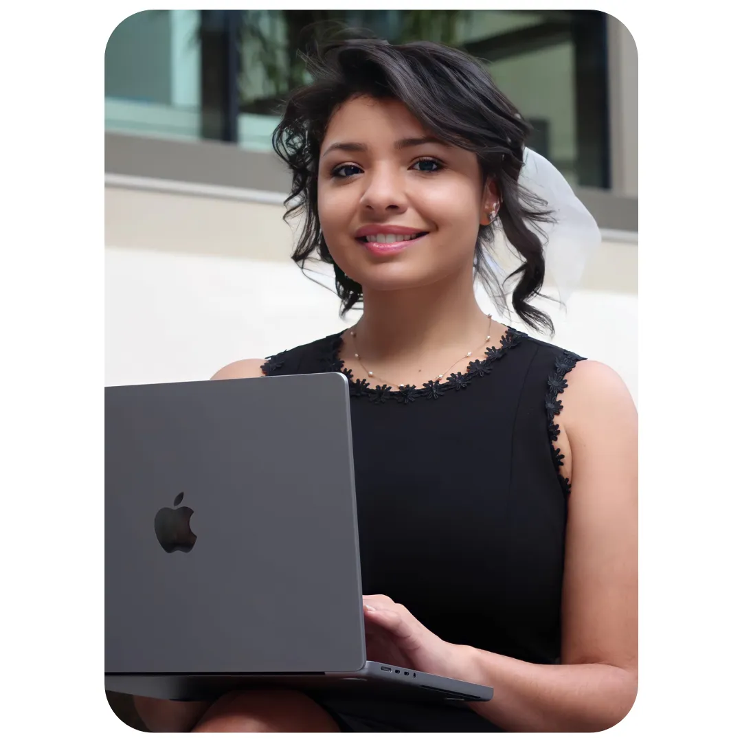 angelica photo holding laptop