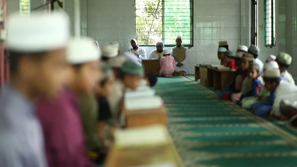 Children studying in a madrasha classroom supported by Islamic Dunya