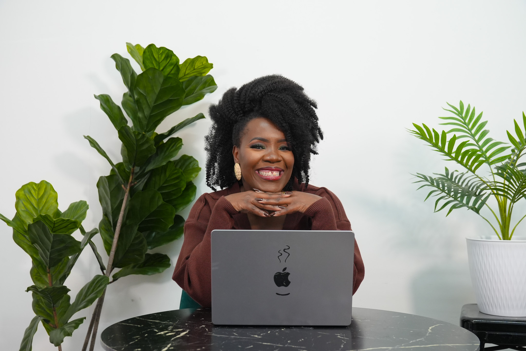 Nadege Fleurimond Smiling holding a mic