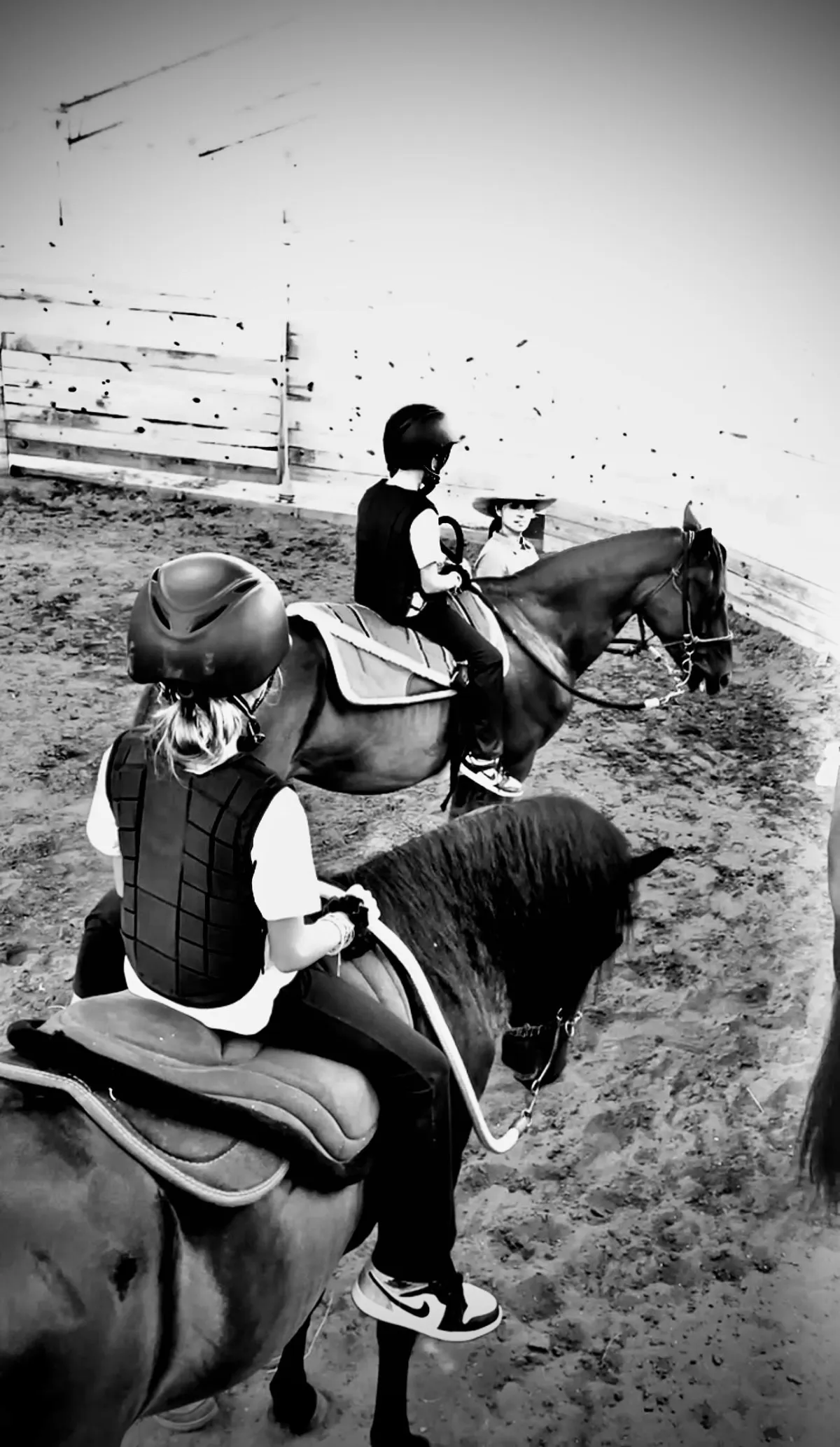 grayscale photography of woman riding on horse