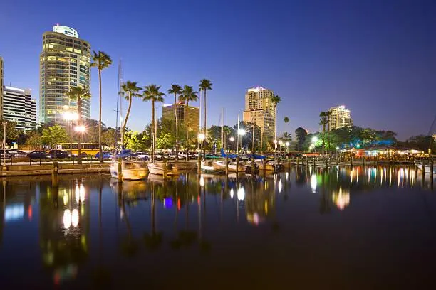 CPA team at Tax & Accounting By The Bay, smiling in a modern Saint Petersburg, FL office