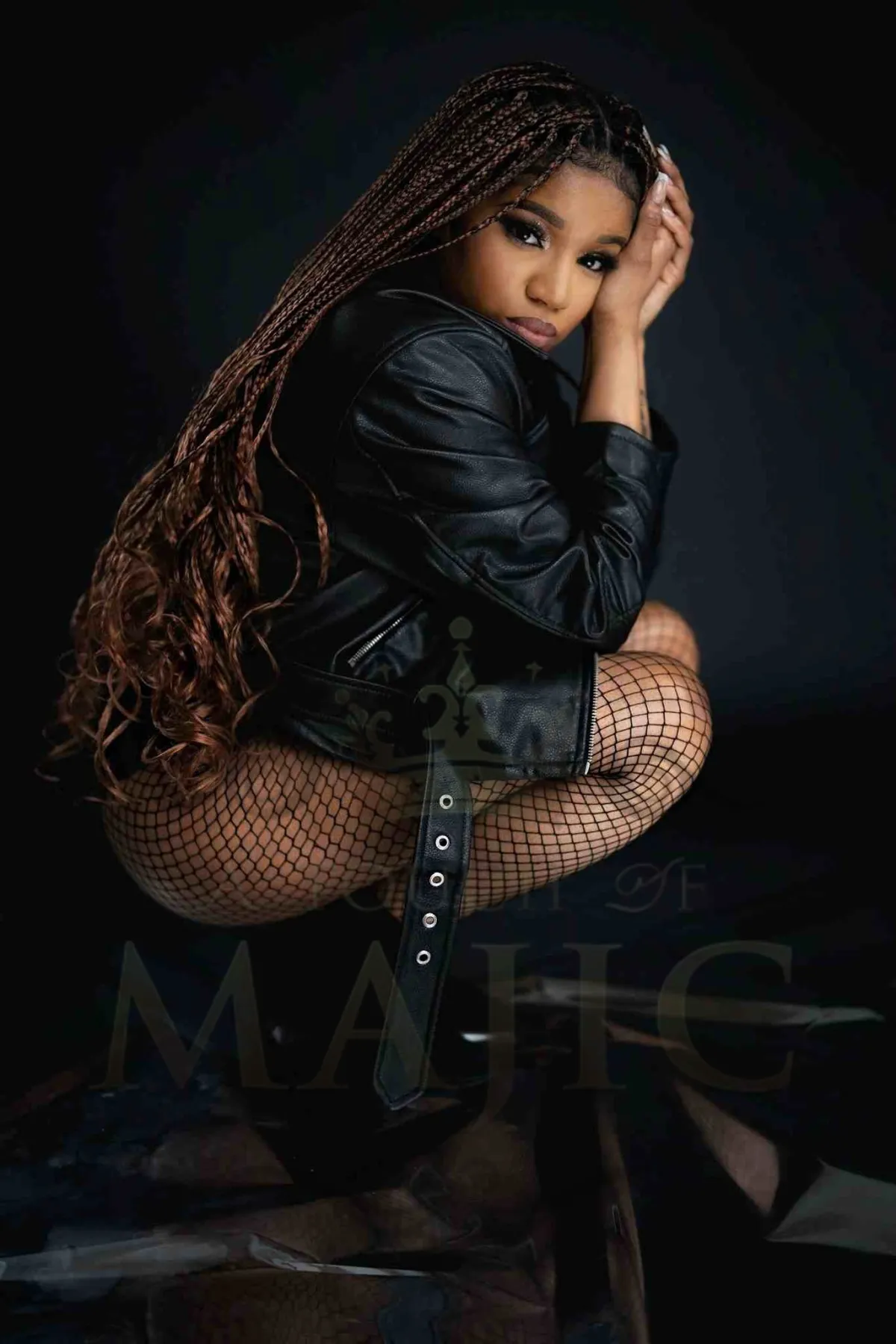 Hair salon showcase portrait with dramatic voluminous blowout and warm halo light