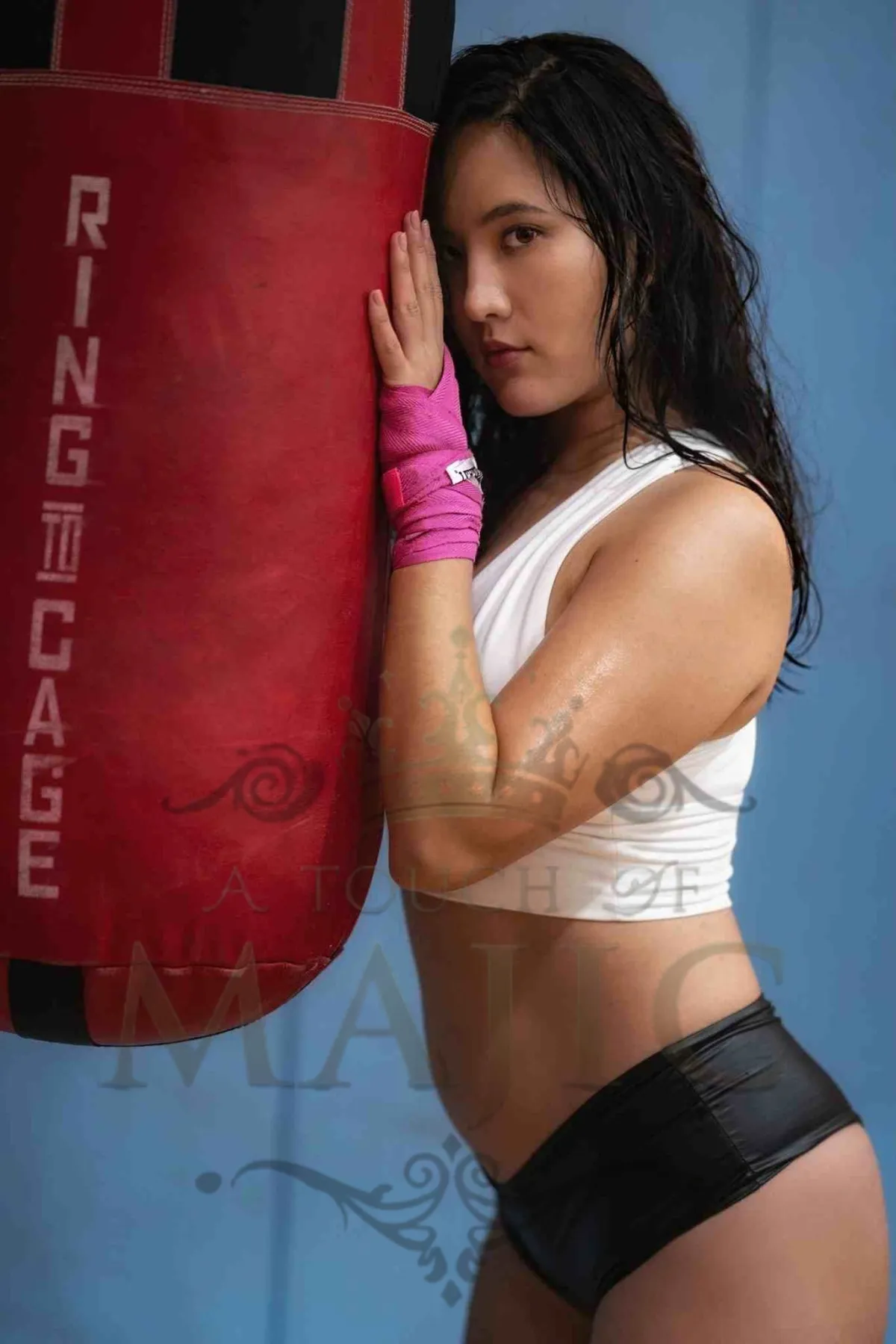 Hair salon showcase portrait with dramatic voluminous blowout and warm halo light