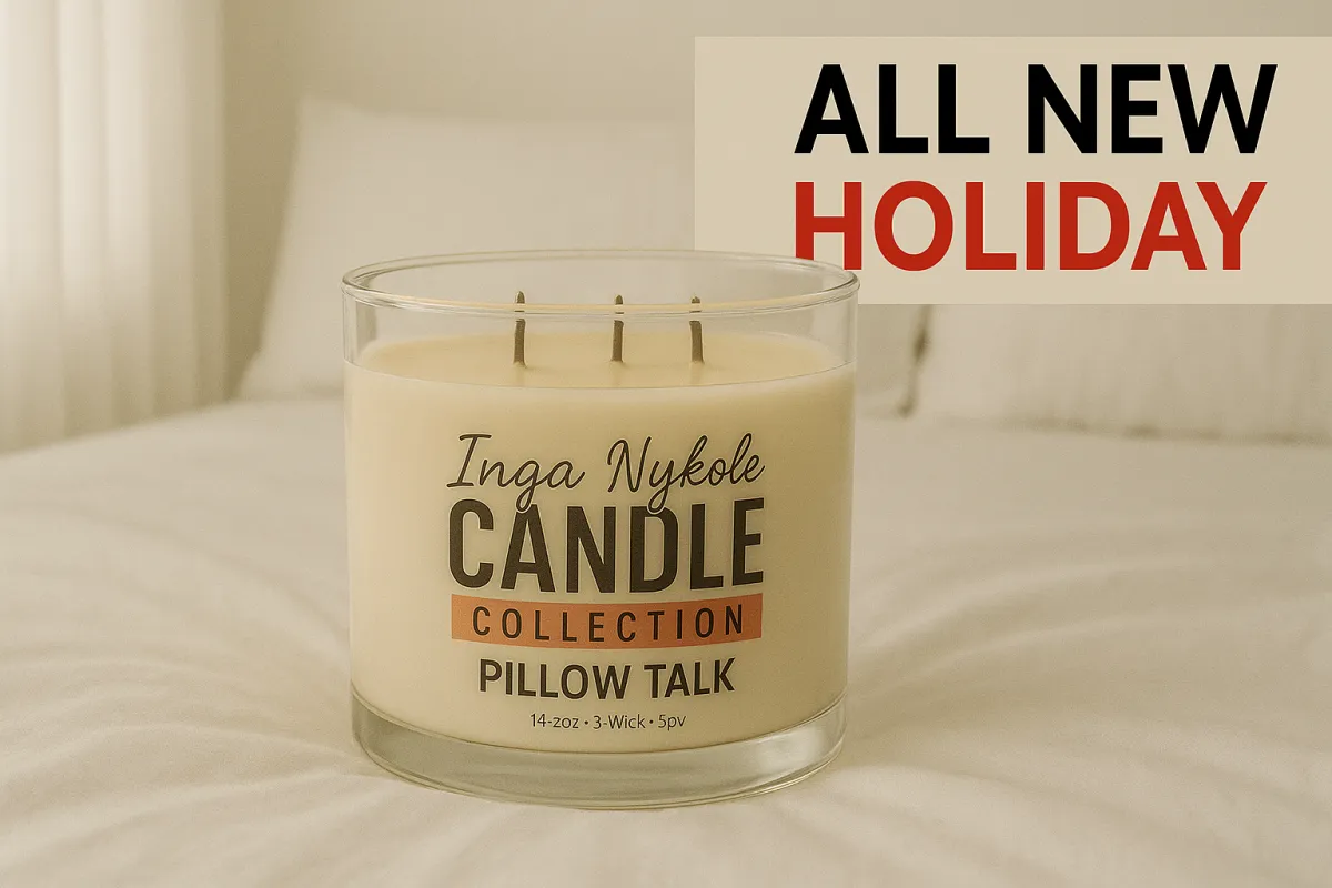 a lit candle in a glass bowl on a black background