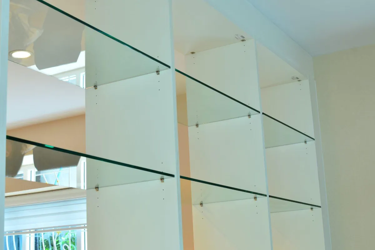 Floating glass shelves mounted in a modern home interior, crafted and installed by RDB Glass – custom glass shelving solutions in Dayton, OH.