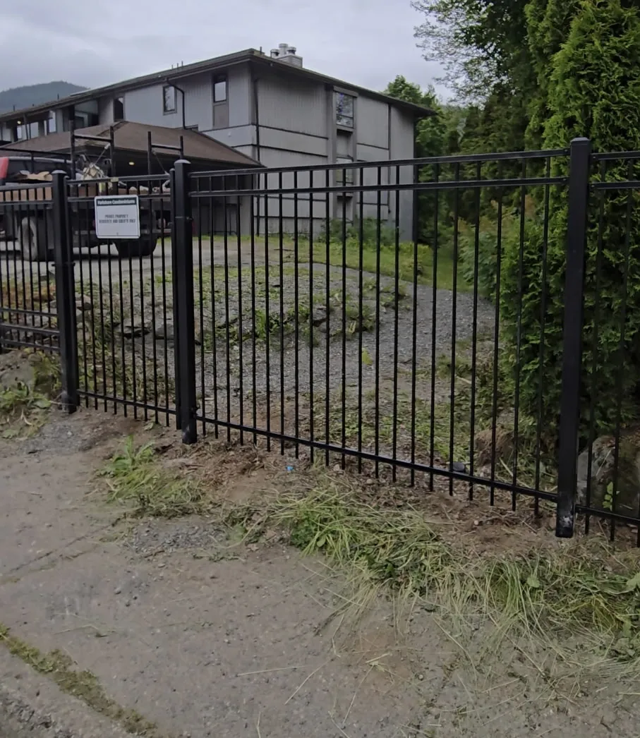 Black metal gate and fencing by Southeast Fence Specialists