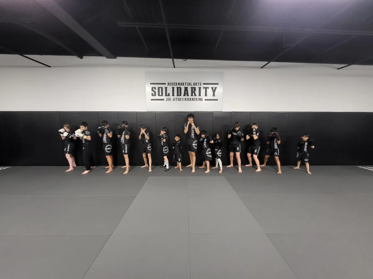 kids kickboxing Frisco, kids MMA classes, martial arts for kids ages 6-12, youth striking classes, kids self-defense Frisco, mixed martial arts for kids, Solidarity MMA kids program, beginner MMA for kids