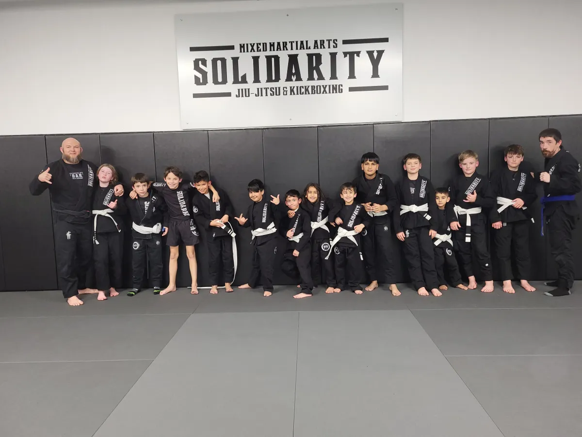 kids gi jiu-jitsu, brazilian jiu-jitsu for kids, BJJ kids Frisco, martial arts ages 6-12, self-defense kids gi, youth gi jiu-jitsu, Solidarity MMA BJJ, kids grappling Frisco