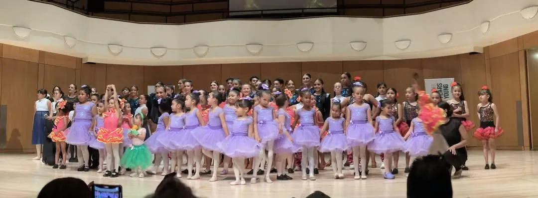group of women in black tank top and black shorts