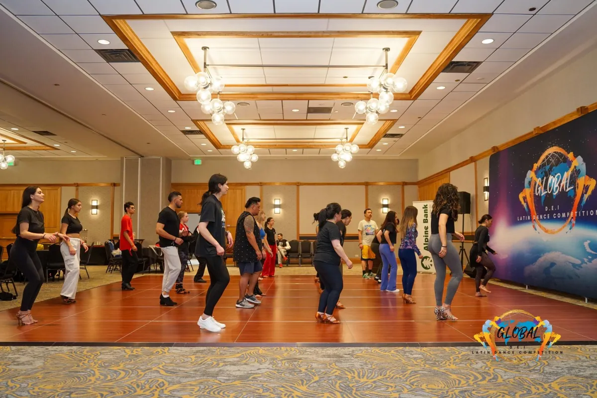 a group of people standing around in a room