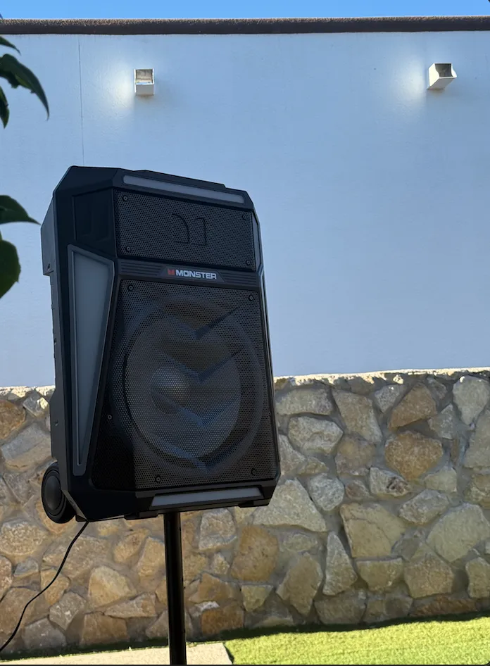 A round banquet table with a crisp white finish, elegantly set for six guests, placed in a sunlit event space with minimalistic decor.
