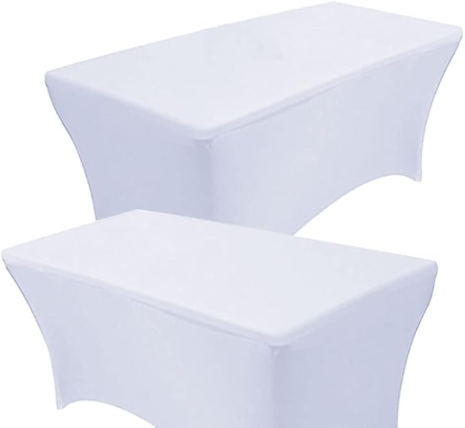 Patterned tablecloth with gold geometric design, covering a square table at a chic event