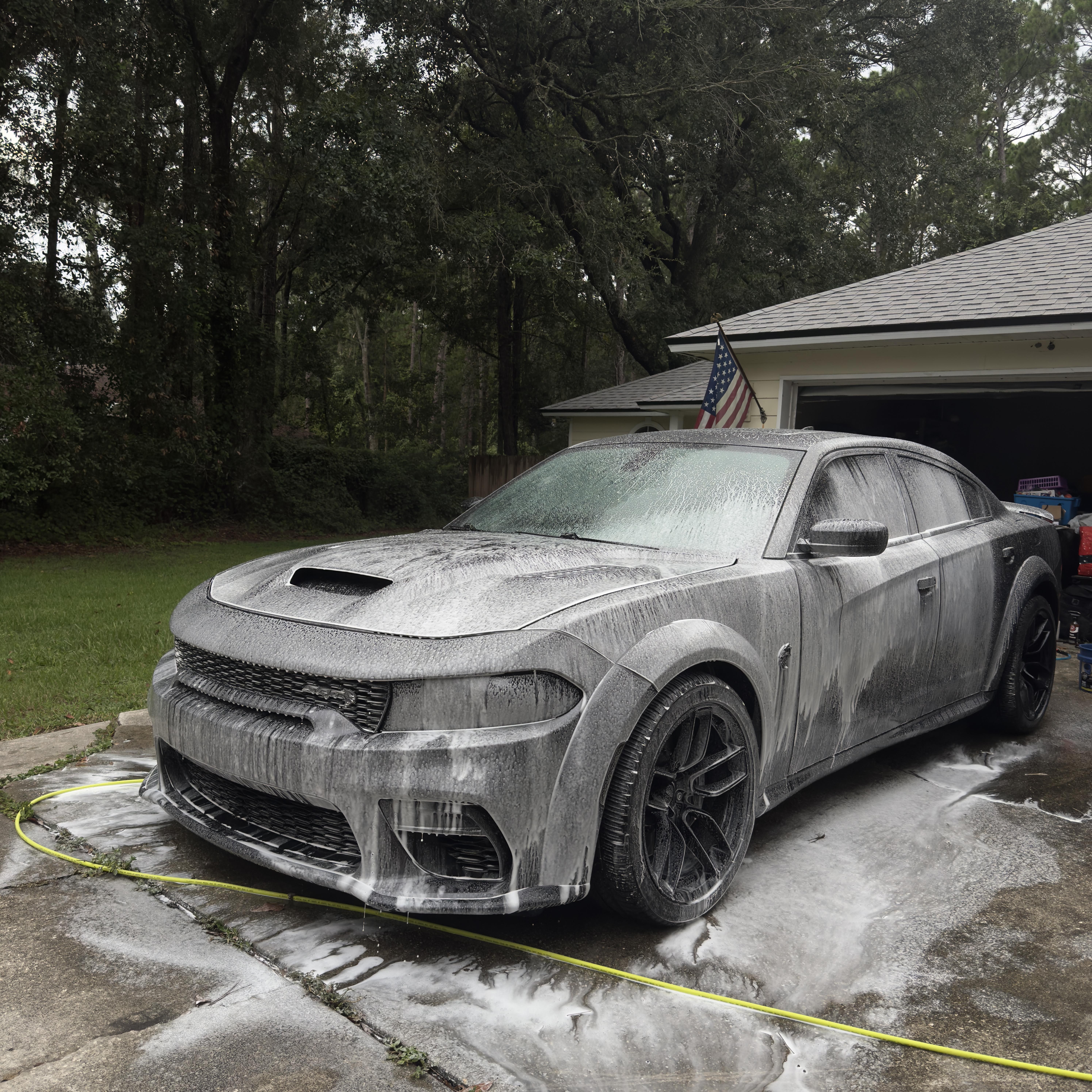 Luxury vehicle detailed with Jacksonville skyline in the background