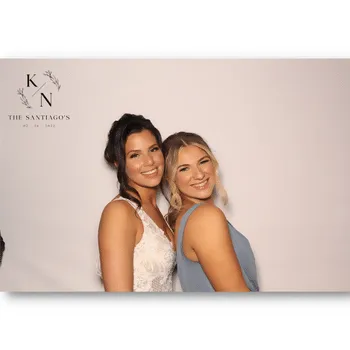 glam photo booth bride and friend at wedding 