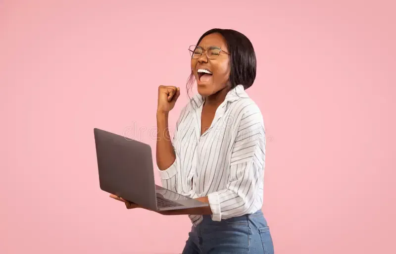 woman in white long sleeve shirt using black laptop computer