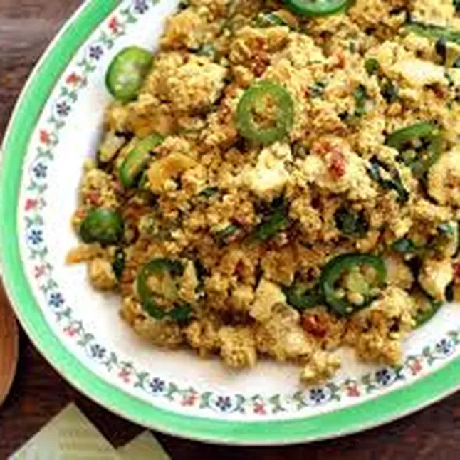 a view of a small town in the mountains