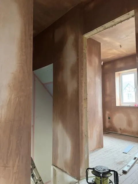 Plastered hallway and staircase with clean lines