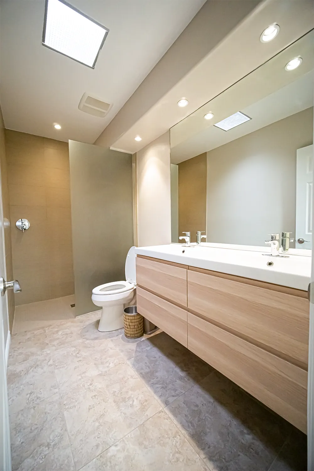alt="Before and after photos of expert bathroom remodel by Unique Remodel in Tucson AZ"