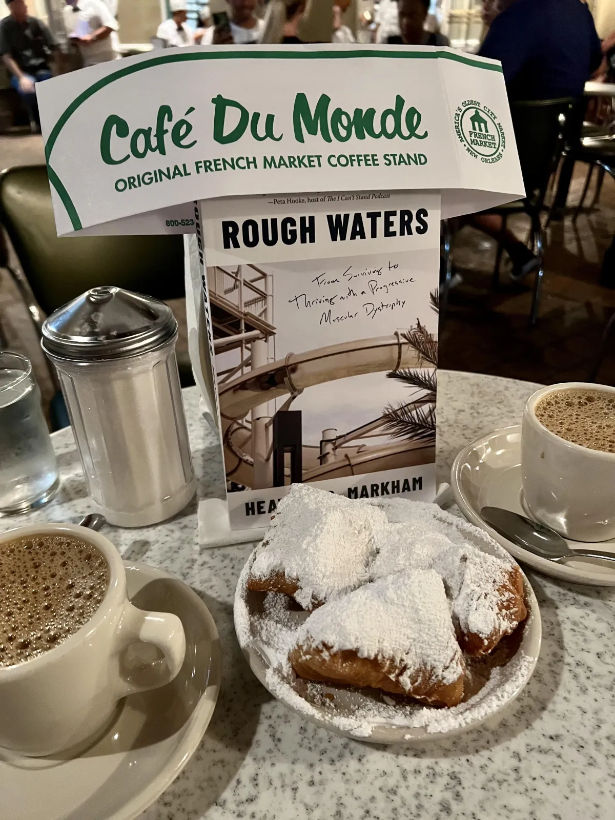 Paul and Heather in formal clothes smiling at the camera