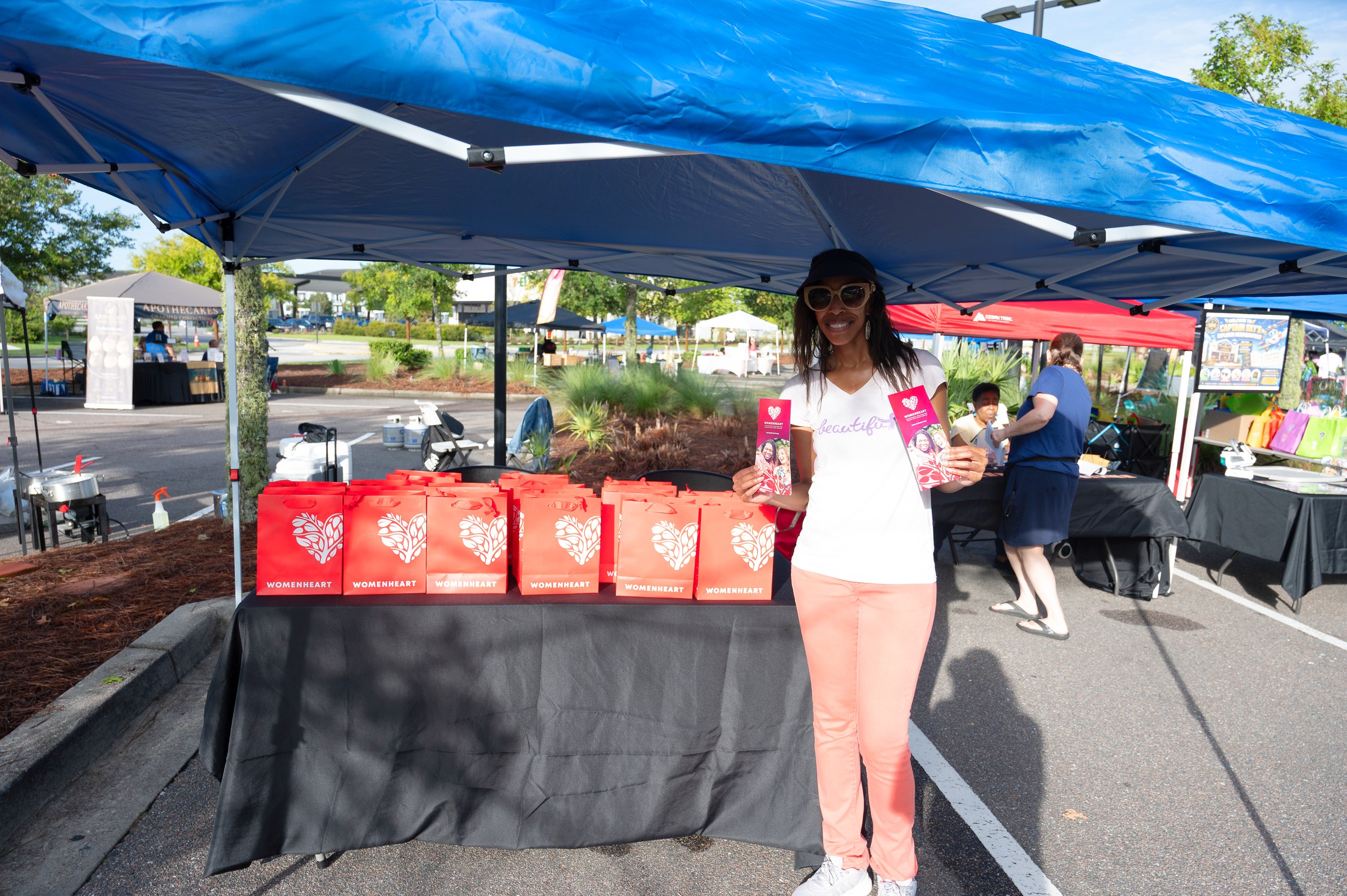 WomenHeart partner table with gift bags and brochures