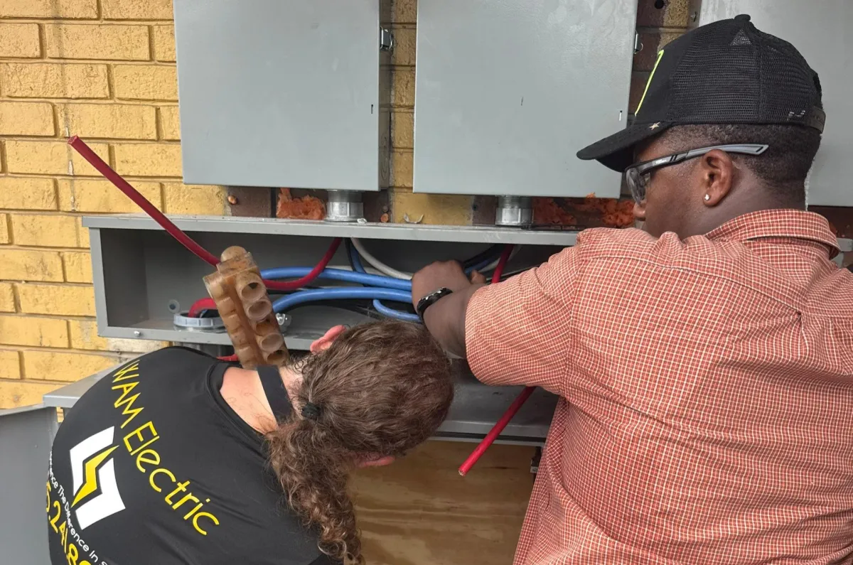 WAM Electric team installing industrial safety disconnects and heavy-duty wiring in Louisiana.