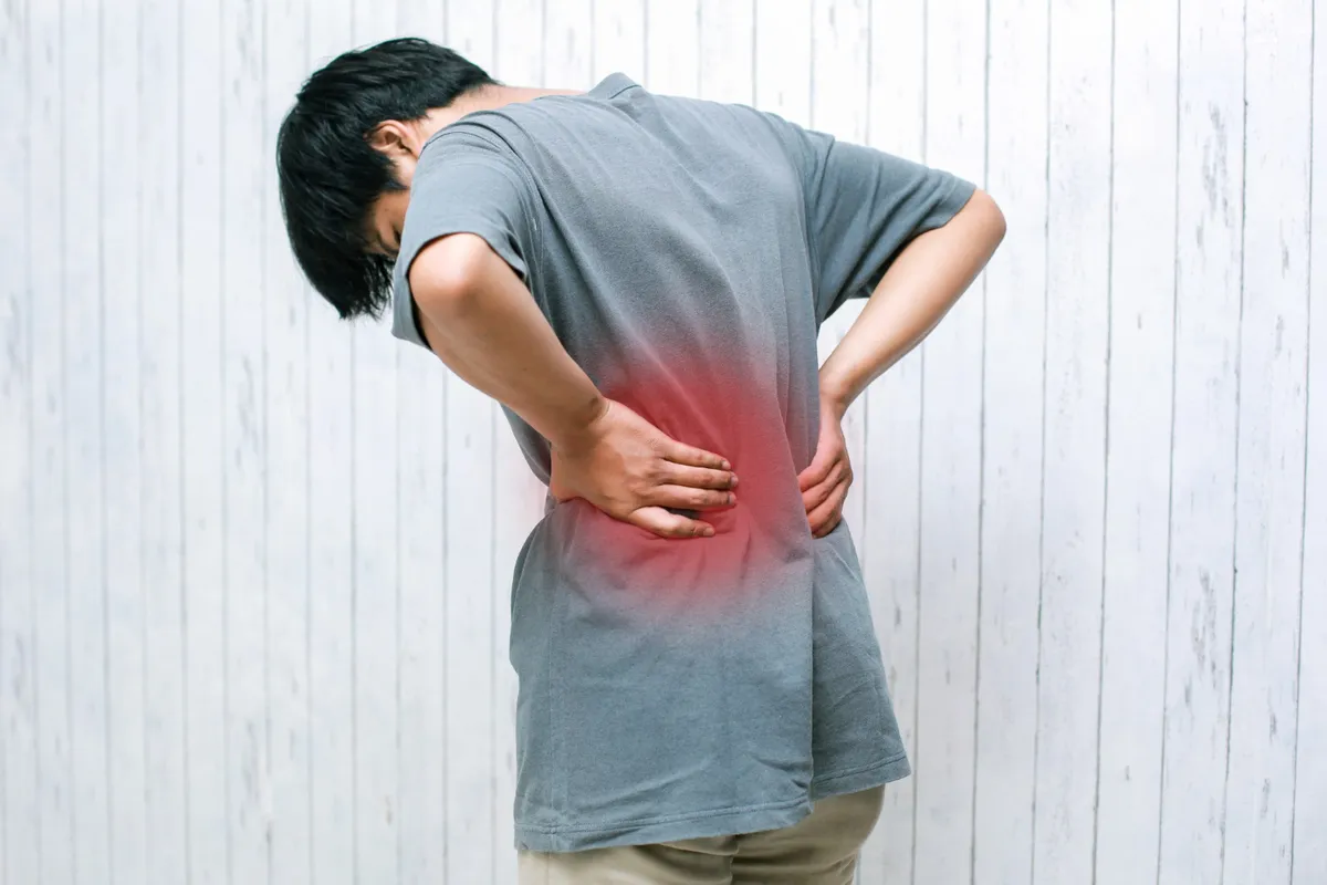 Person with back pain
