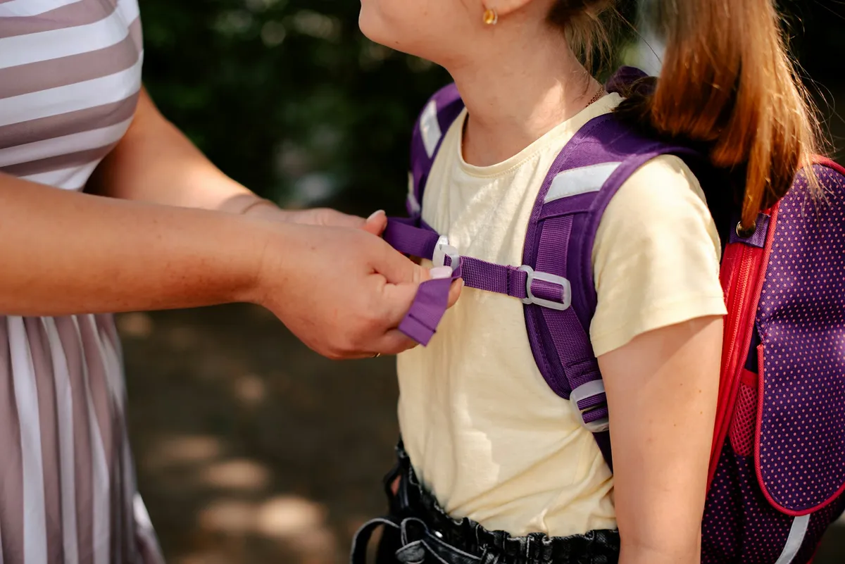 a child wearing a backpack