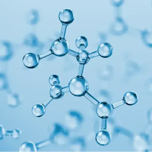 brown rocky shore with green moss and blue sea water during daytime