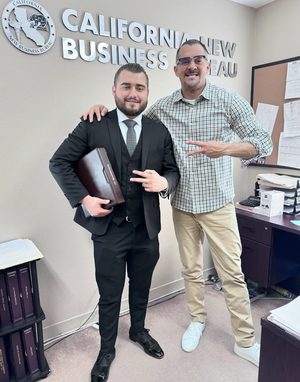 two person standing on gray tile paving