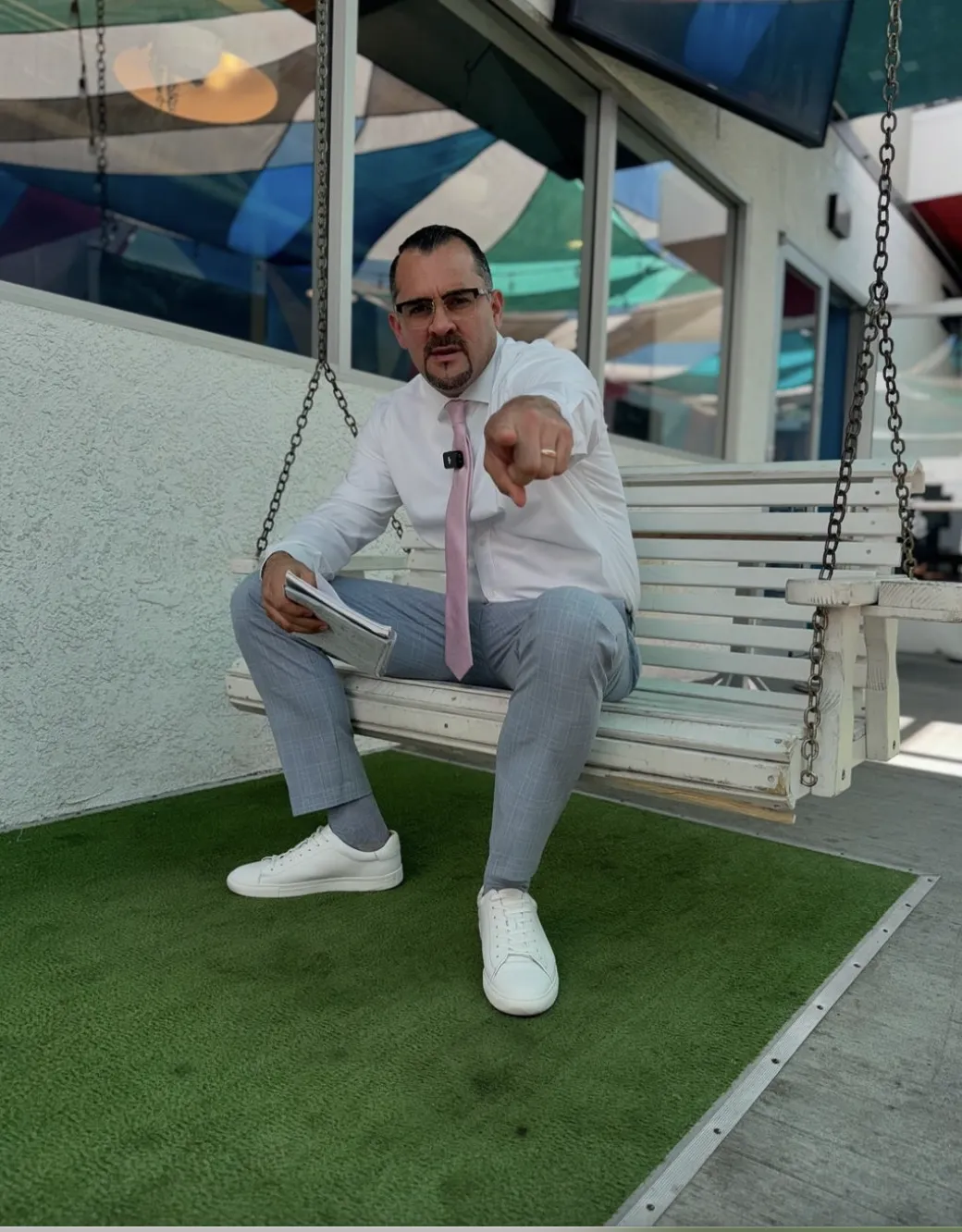 a close up of a camera and a cup