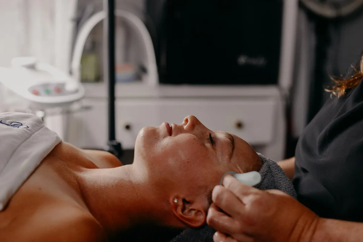 Client receiving a anti-aging, exfoliating, deep cleaning treatment by Lindsay Rose Ali at Lindsay Rose Beauty in Mansfield, Texas