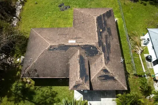 inspecting old roof in lacey
