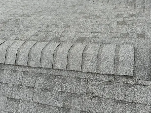 Ridge cap shingles on new PABCO Premier architectural roof in Lacey, WA - United Roofing Solutions
