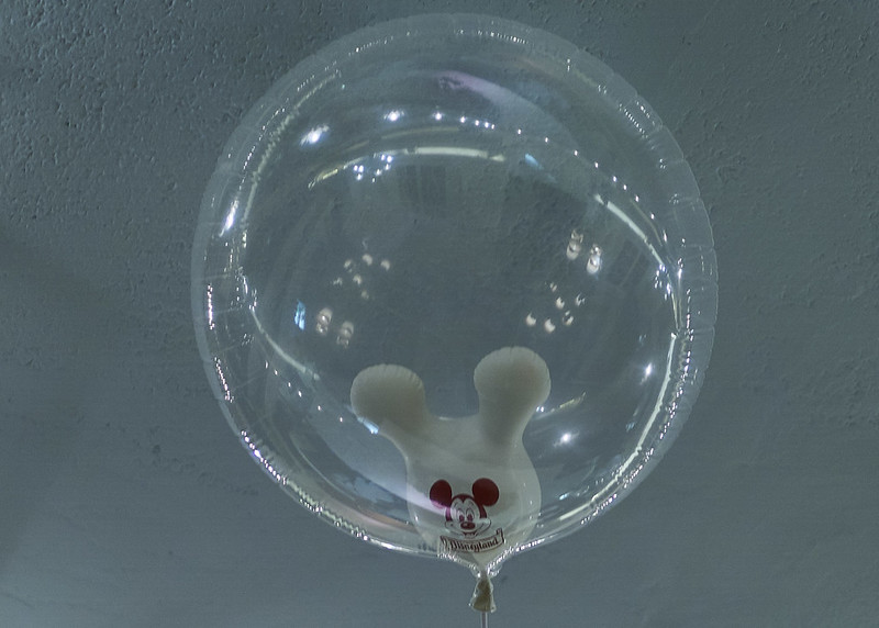 A Shrunken Head Mickey Mouse Head Balloon
