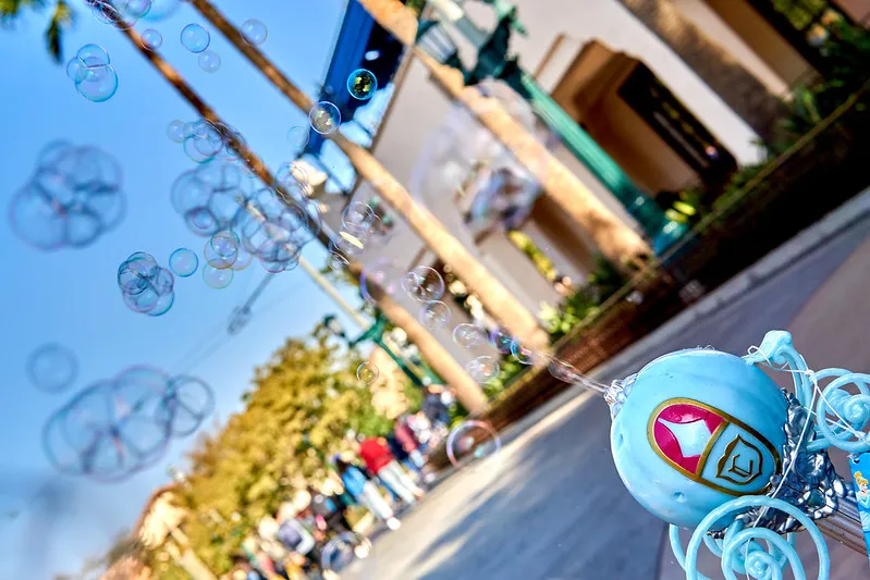 An ordinary walkway becomes more interesting when a bubble wand adds a little magic to the scene.