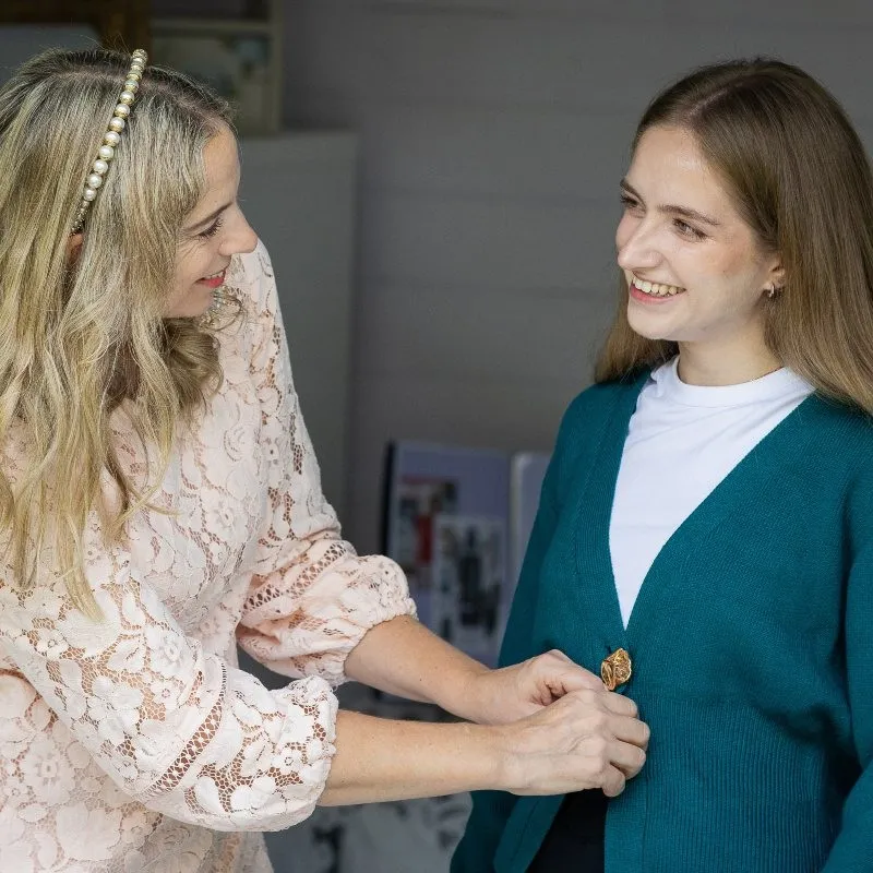 personal shopper buckinghamshire personal stylist amanda waterstone with a client trying on a jumper