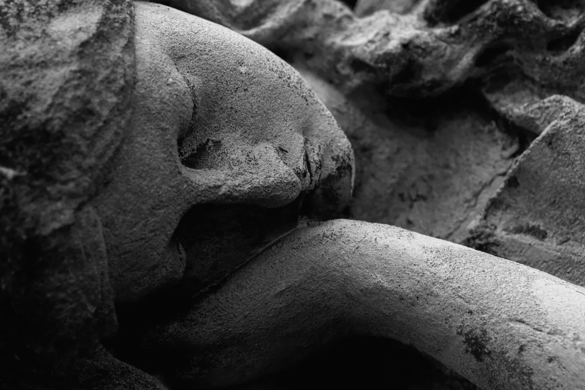 Person sleeping peacefully in black and white, representing sleep quality